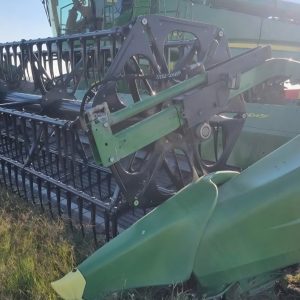 John Deere 645FD Flex Draper header attached to a combine harvester – wide cutting platform for grain harvesting in South Africa