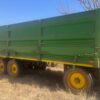 Used green farm trailer with double axles for sale – secondhand agricultural equipment available in South Africa