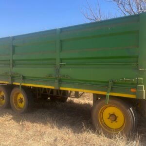 Used green farm trailer with double axles for sale – secondhand agricultural equipment available in South Africa